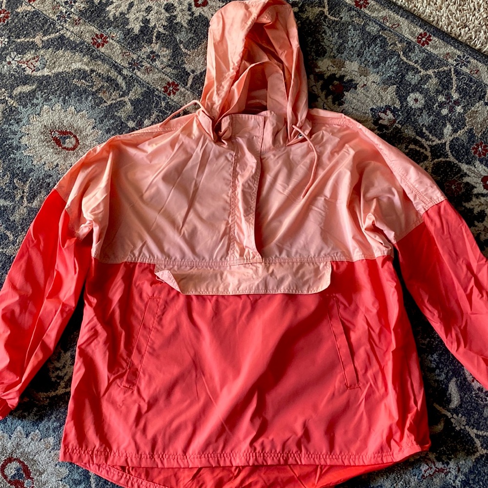 Large, Lauren James windbreaker. Light pink/salmon color. Multiple pockets